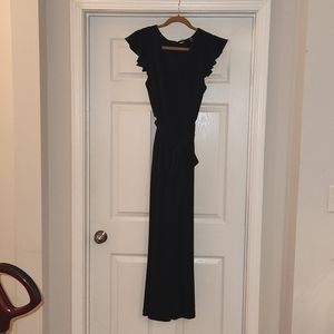NWT Tahari size 14 navy flutter sleeve jumpsuit with removable tie at waist.